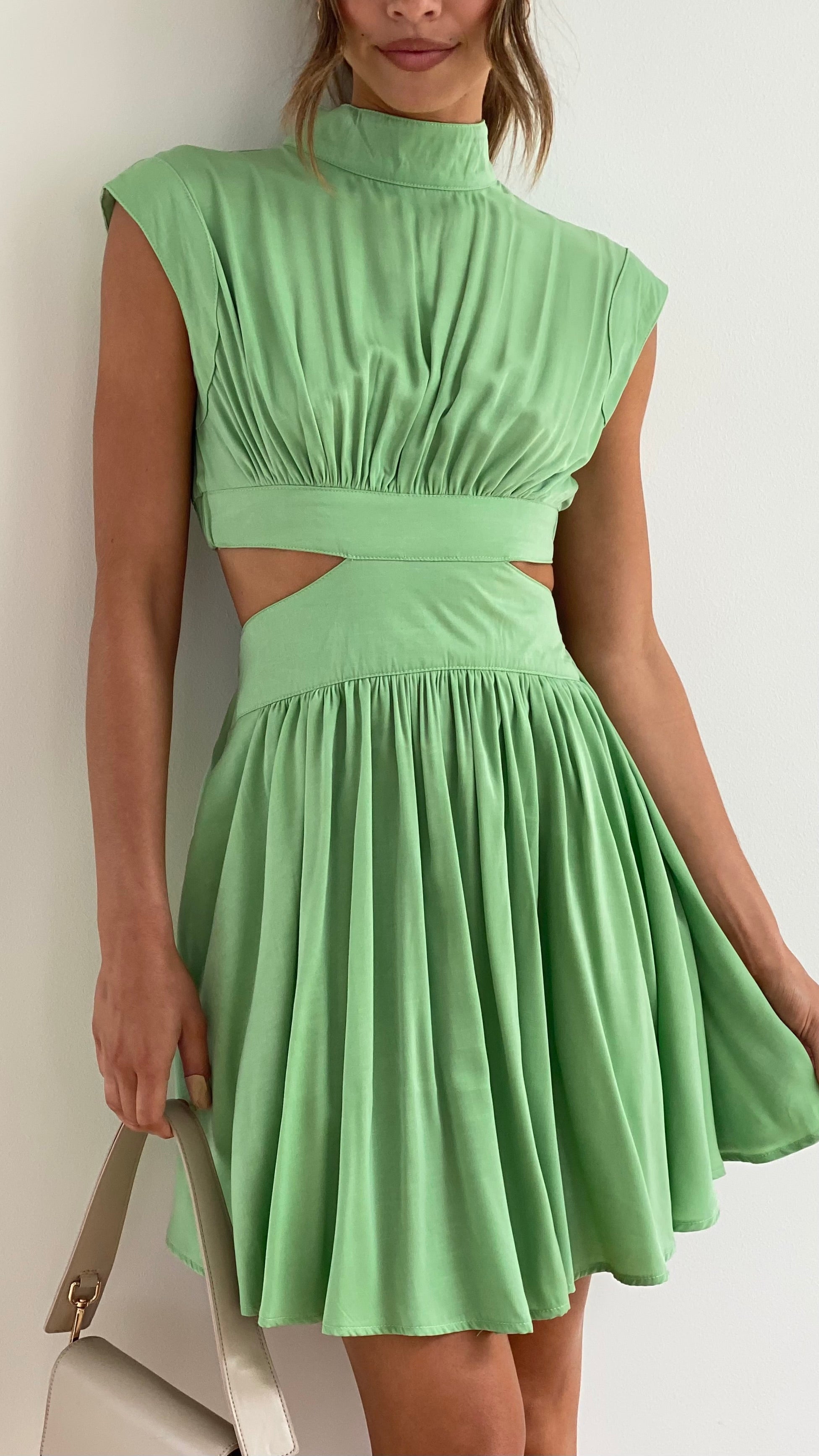Women's Sleeveless Mini Dress With High Neck And Cutout Design